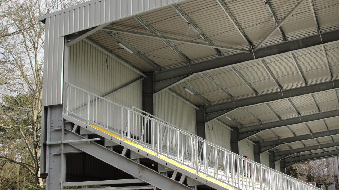 A large building with stairs leading up to the top of it.