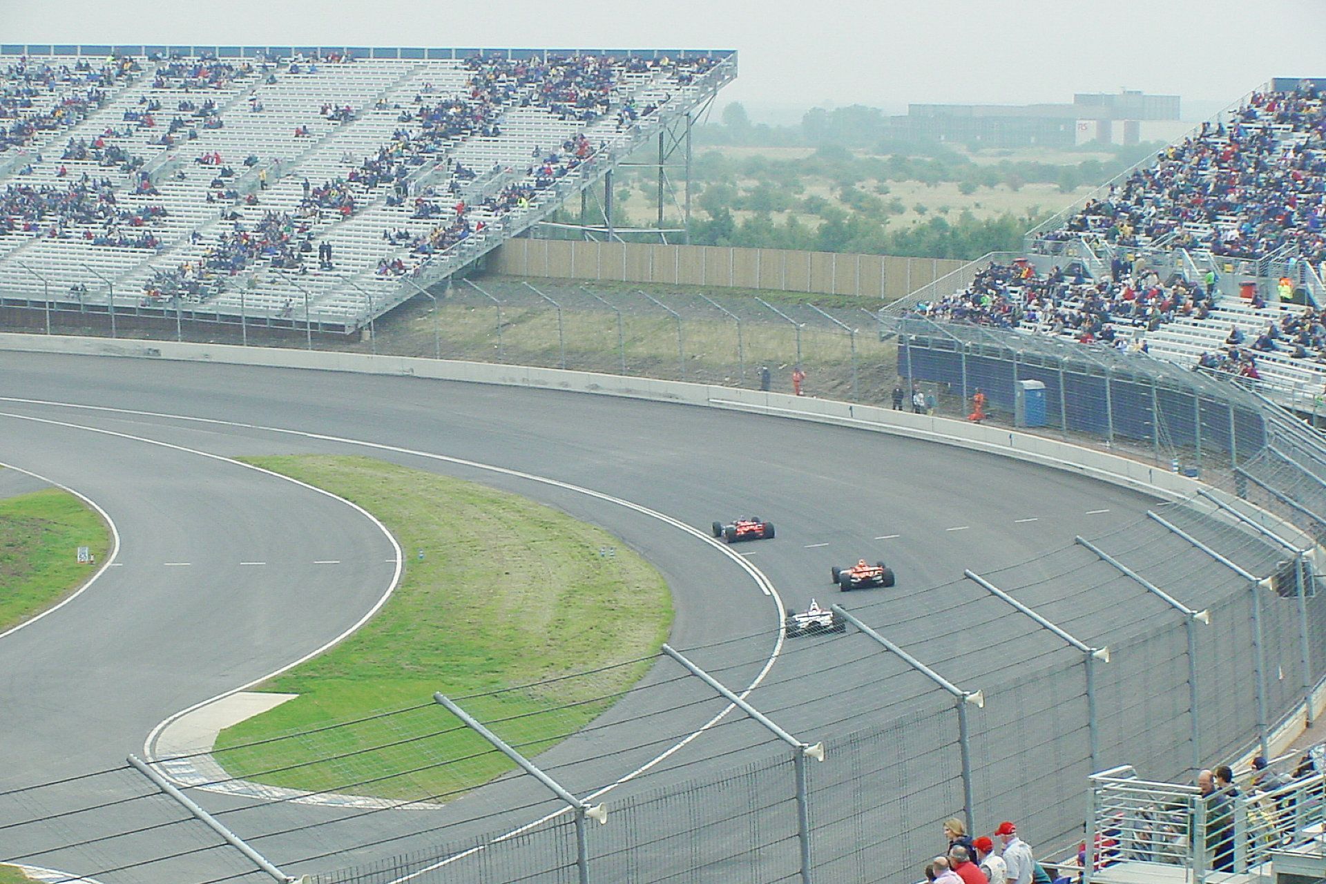 A race track with a lot of people in the stands