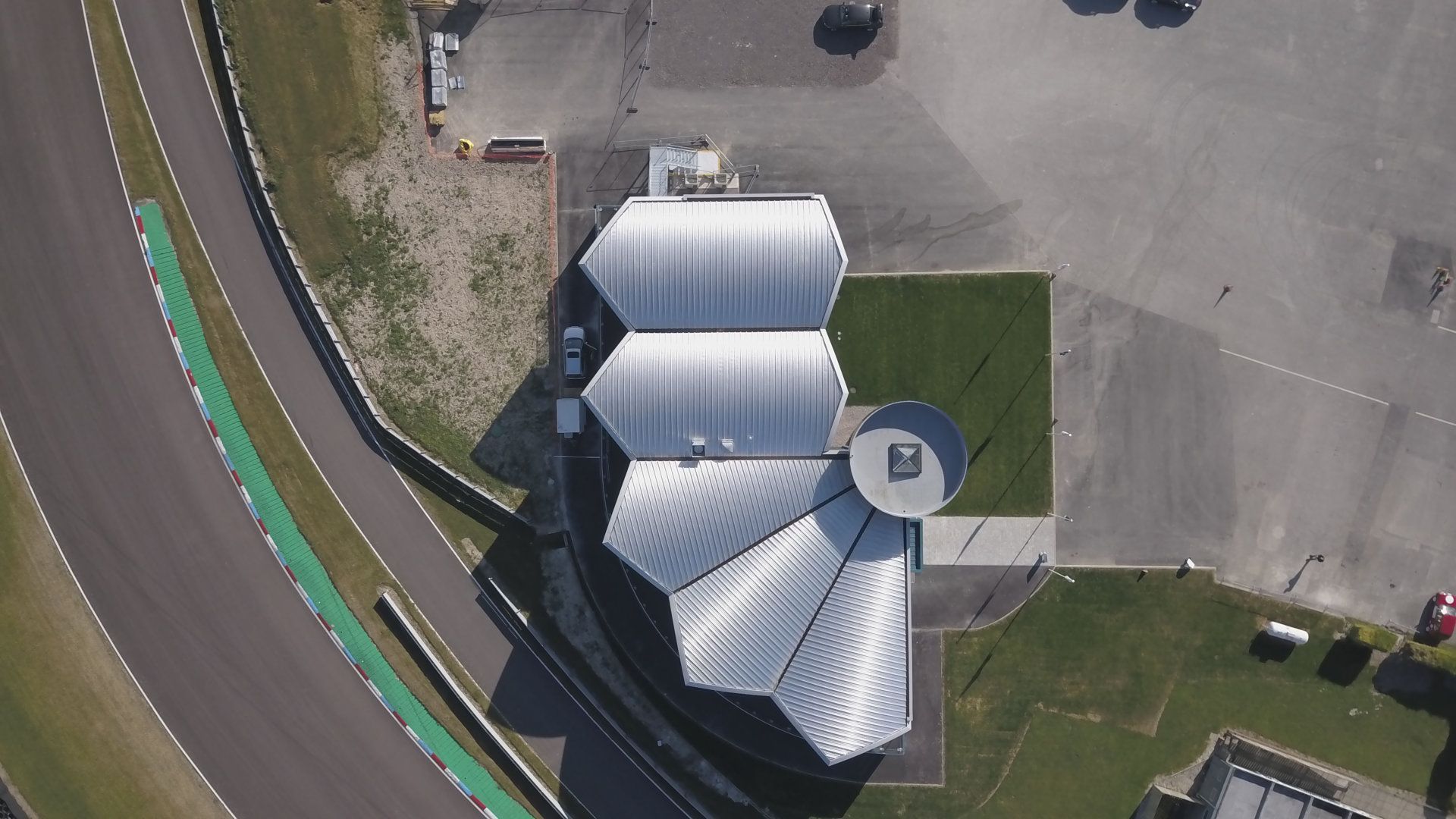 An aerial view of a building on a race track