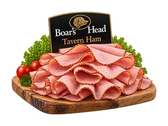 Boar’s Head Tavern Ham slices on a wooden display board at Joe’s Produce