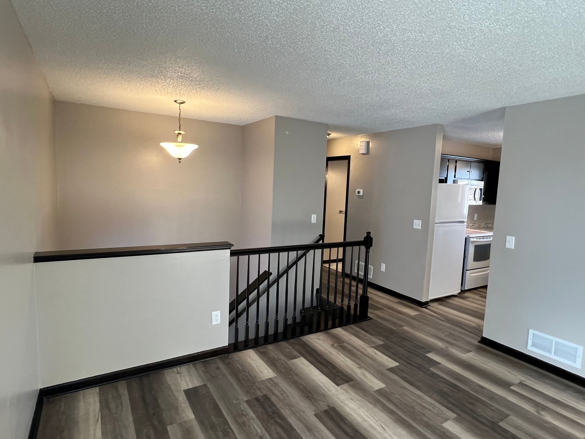 There is a staircase leading up to the second floor of the house.