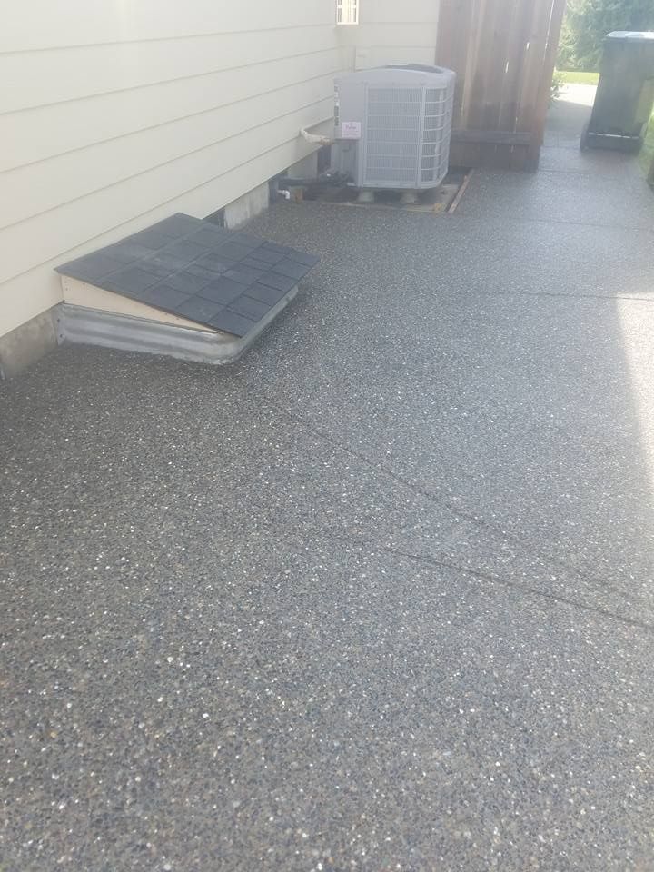 Durable exposed aggregate slab designed for drainage and longevity