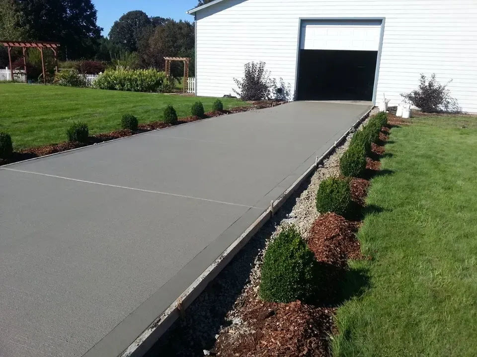 Residential concrete airstrip installation with a broom finished surface