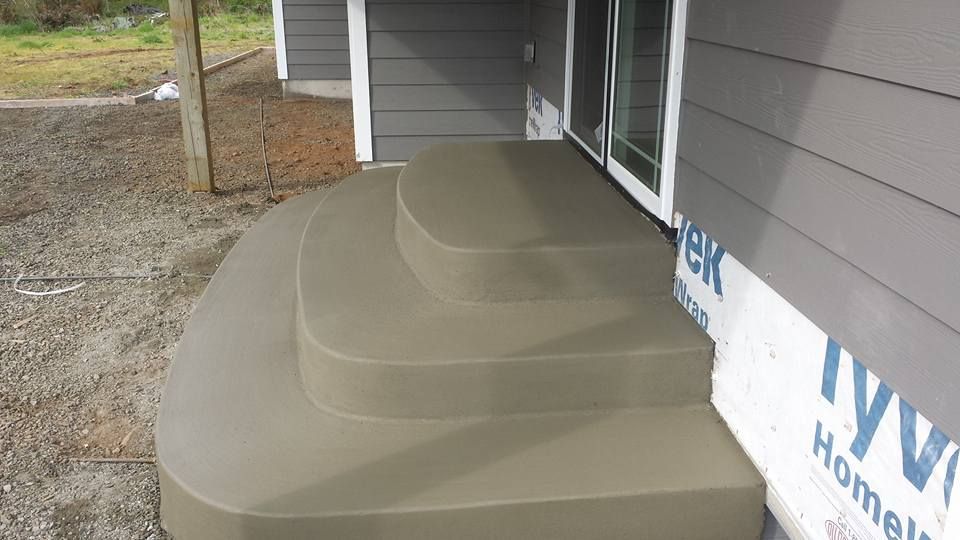 Smooth finish concrete stair set with rounded edge forming