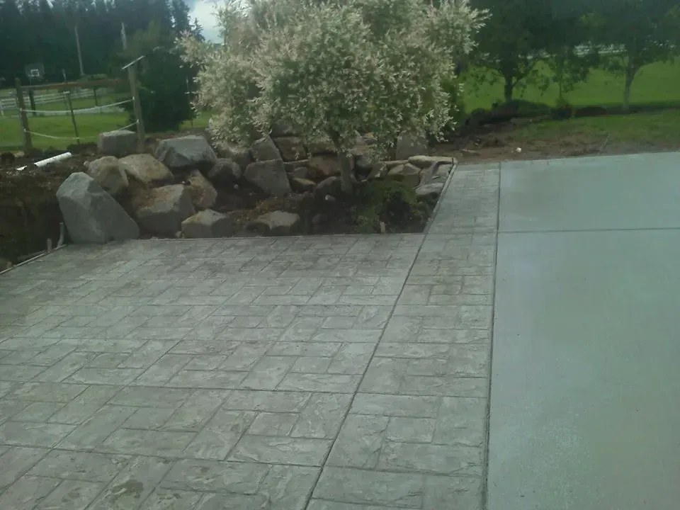 Residential patio featuring stamped concrete border detail