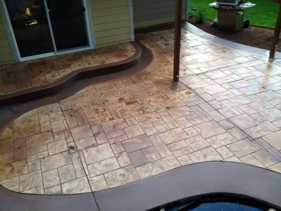 Custom textured concrete surface with flowing curved design layout