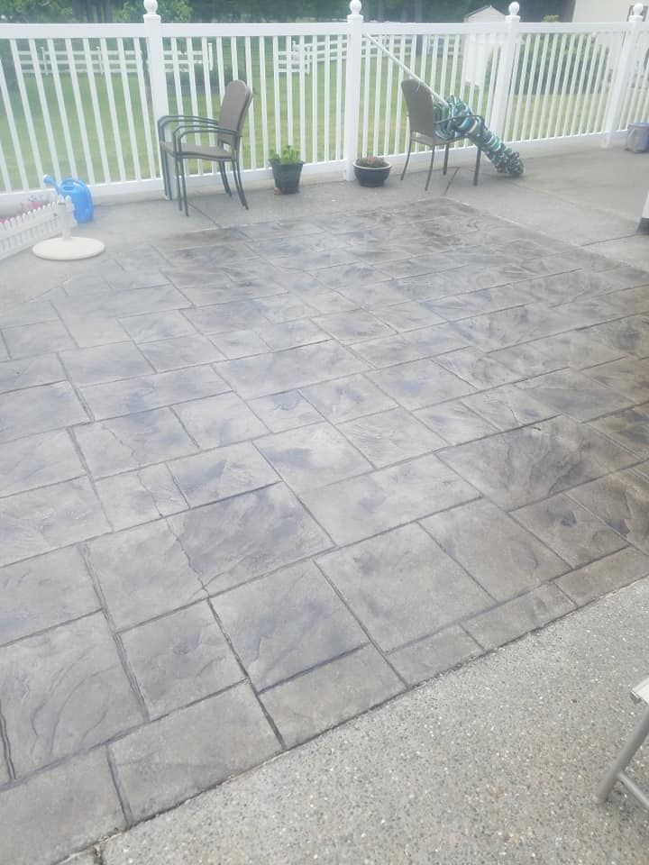 Textured backyard patio designed for durability and visual appeal