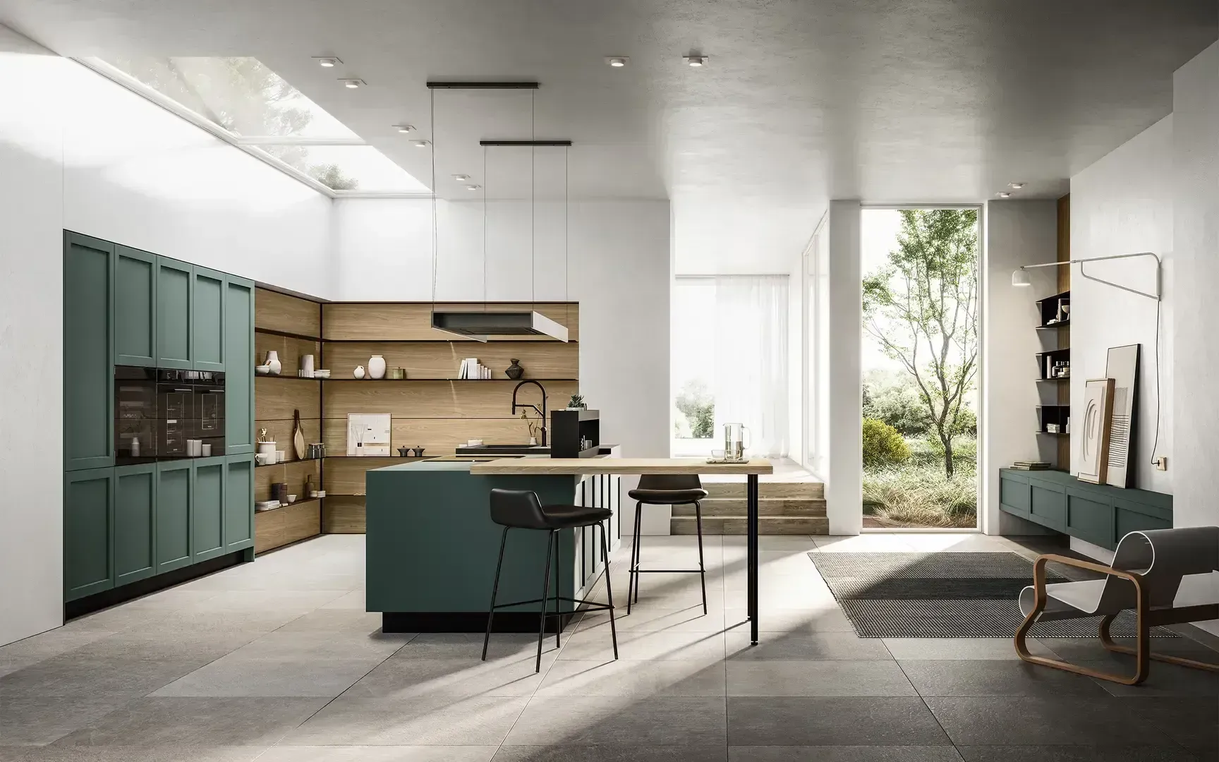 Cucina moderna e luminosa con mobili verdi, scaffali in legno, isola centrale e ampie finestre che si affacciano sul verde.
