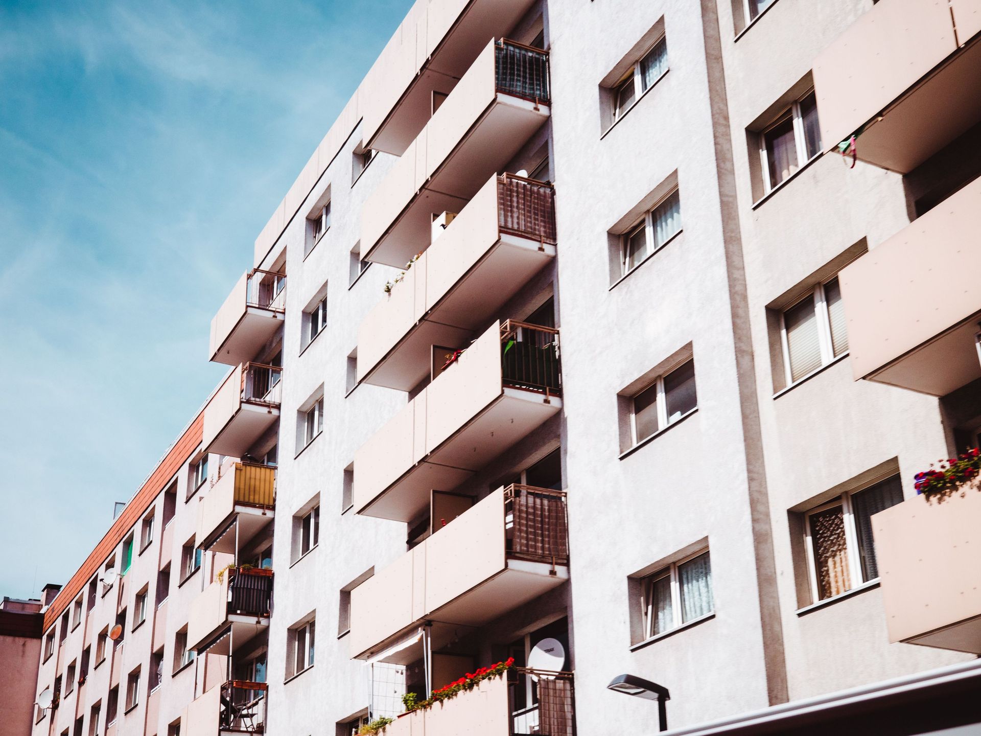 Modern apartment building with balconies, similar to unit stock in Charlestown and New Lambton, NSW.