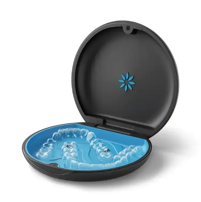 a black case with a blue tray filled with teeth .