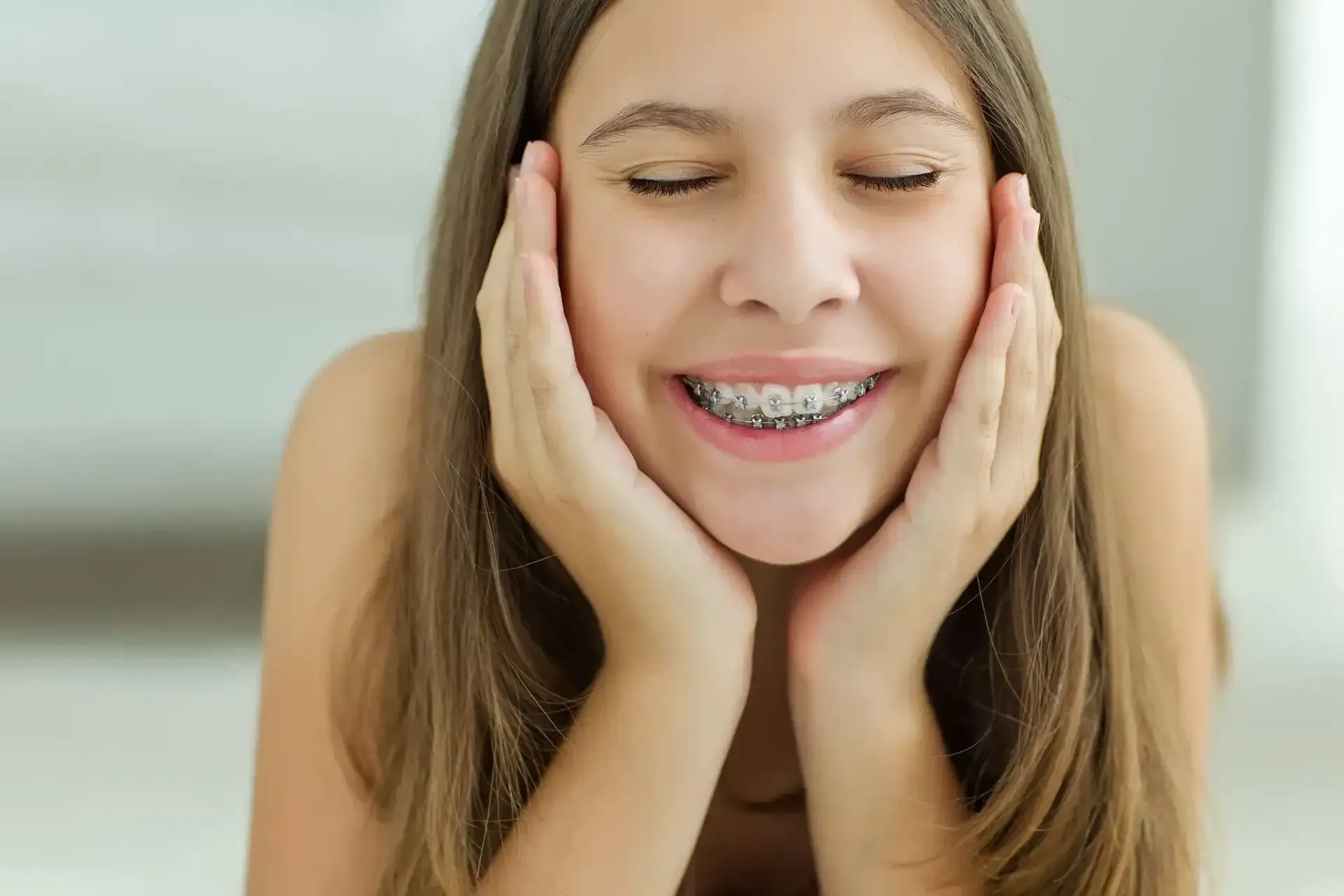 Girl smiling with Orthodontic braces