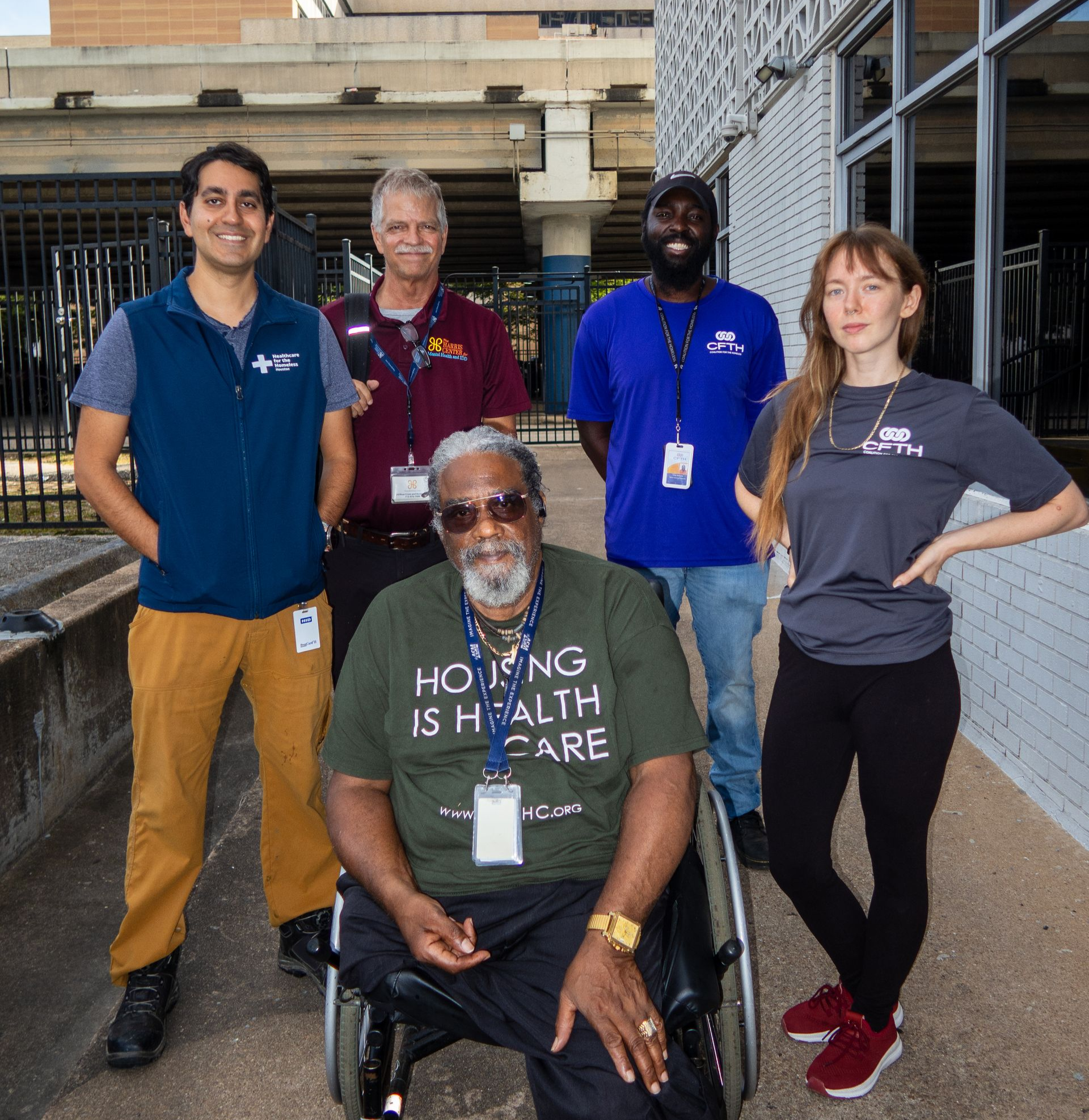 Members of the SMART team pose together outside, representing partner organizations involved in coordinated street outreach and care.