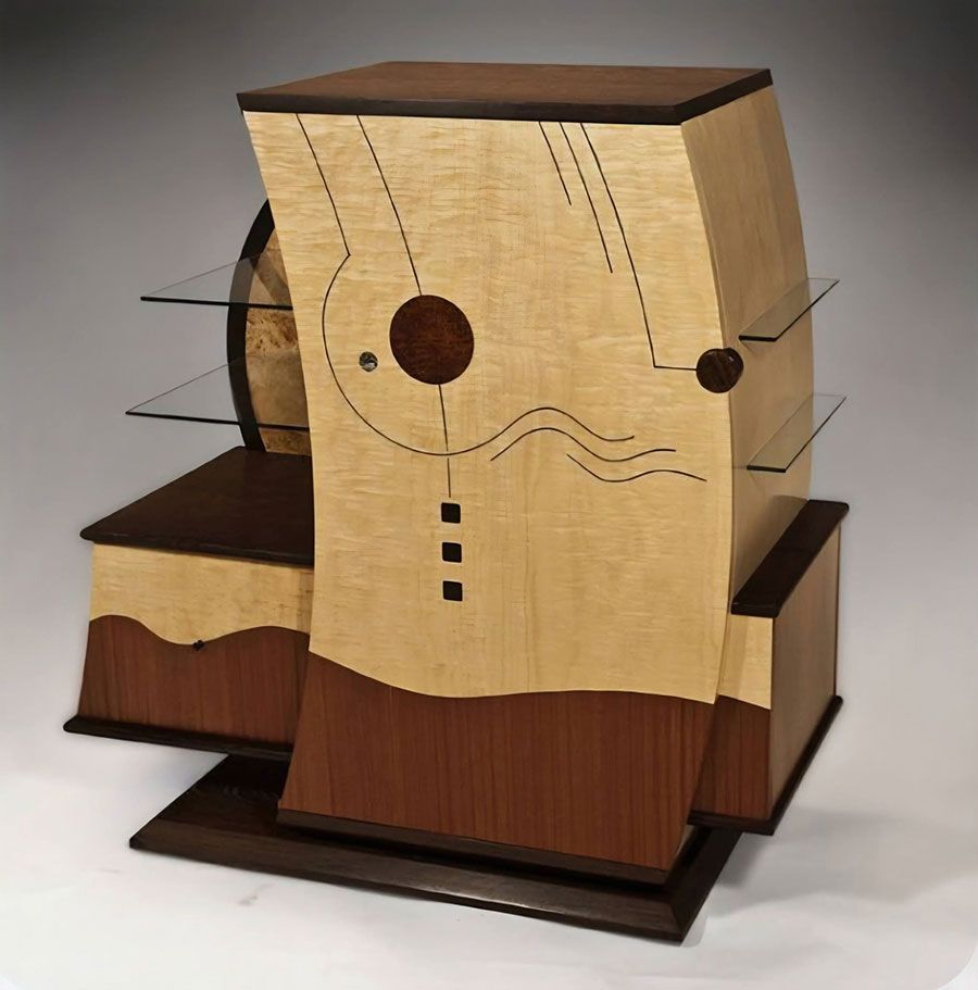 Stylized wooden cat-shaped cabinet with curved front, dark brown top and base, and decorative cutout face accents