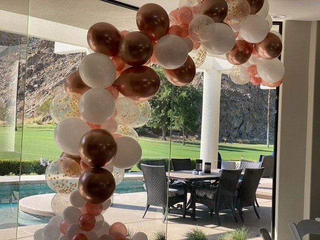 Rose gold balloon arch