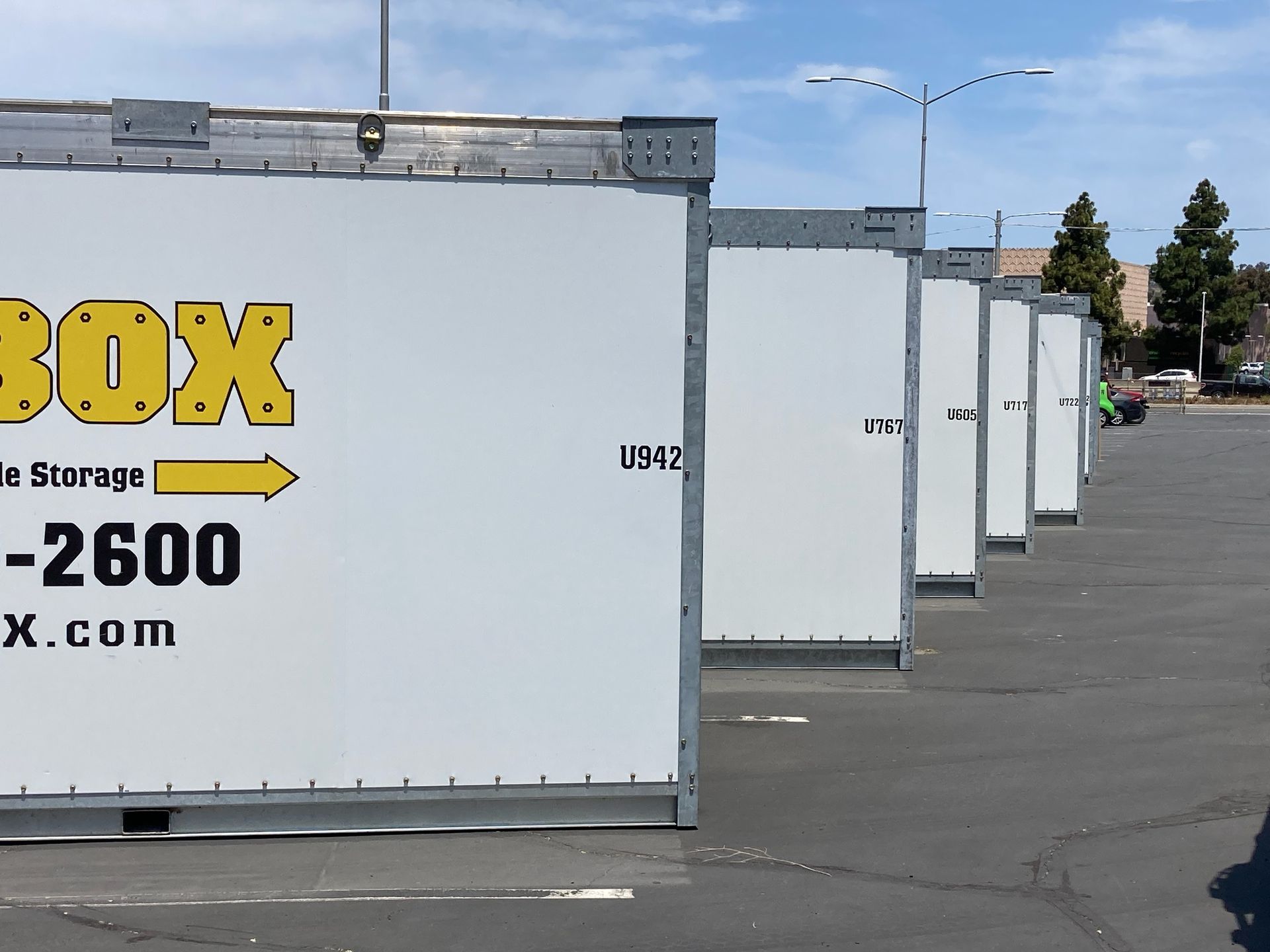 A row of white containers with the word box on them