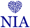 A heart composed of travel icons above the letters "NIA" in blue.