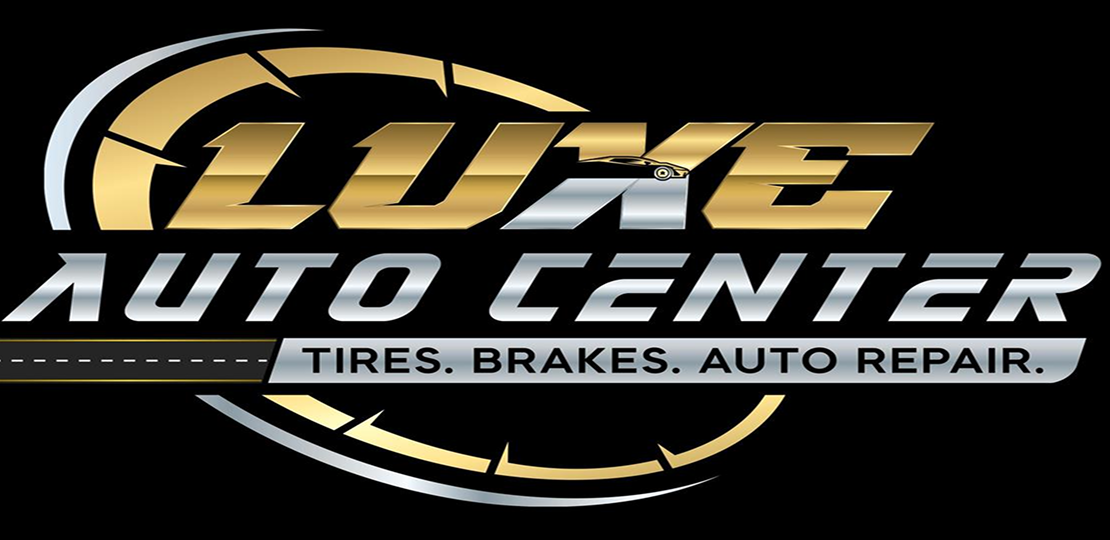 Luxe Auto Center logo with gold and silver text and a tire graphic on black background