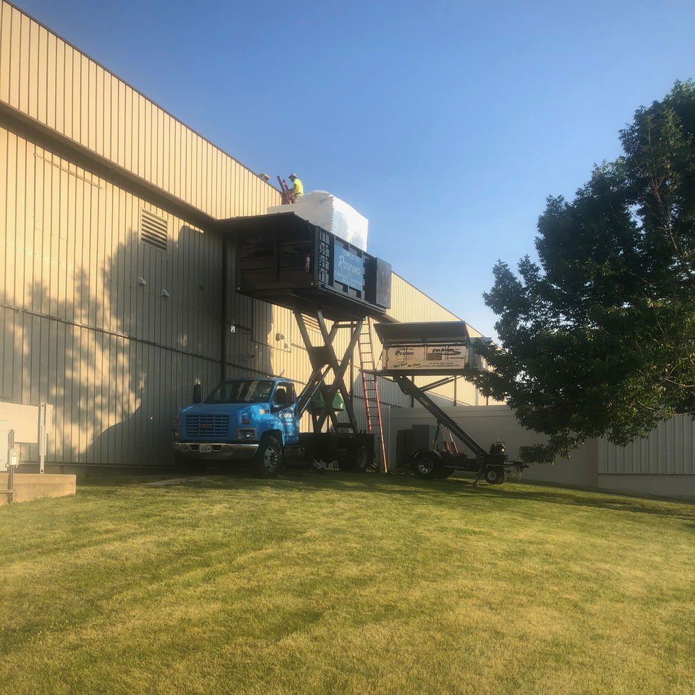 Repairing Roof of Commercial Building — Galesburg, IL — Templeton Roofing Company