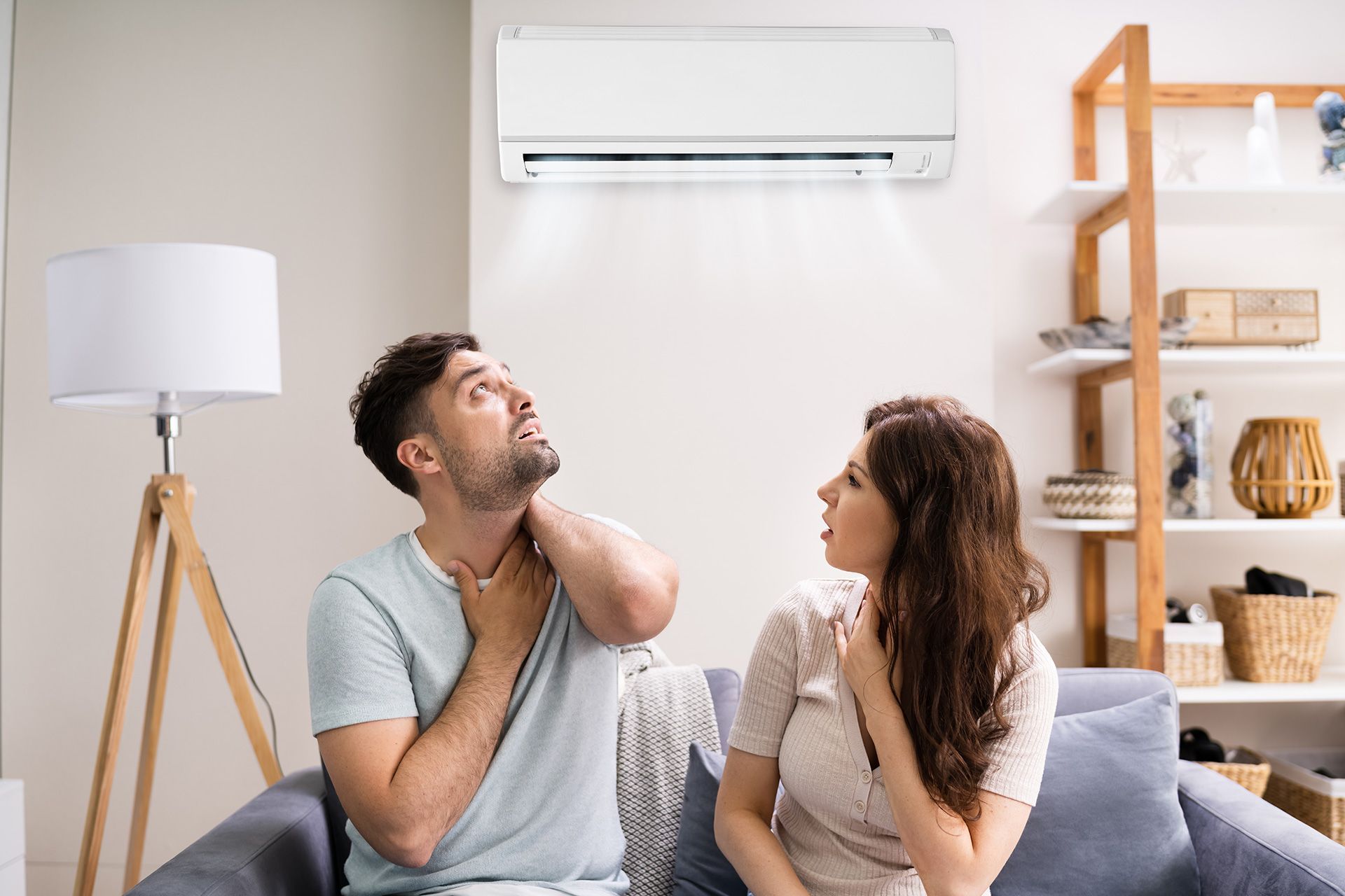 Technician inspecting the air conditioning system