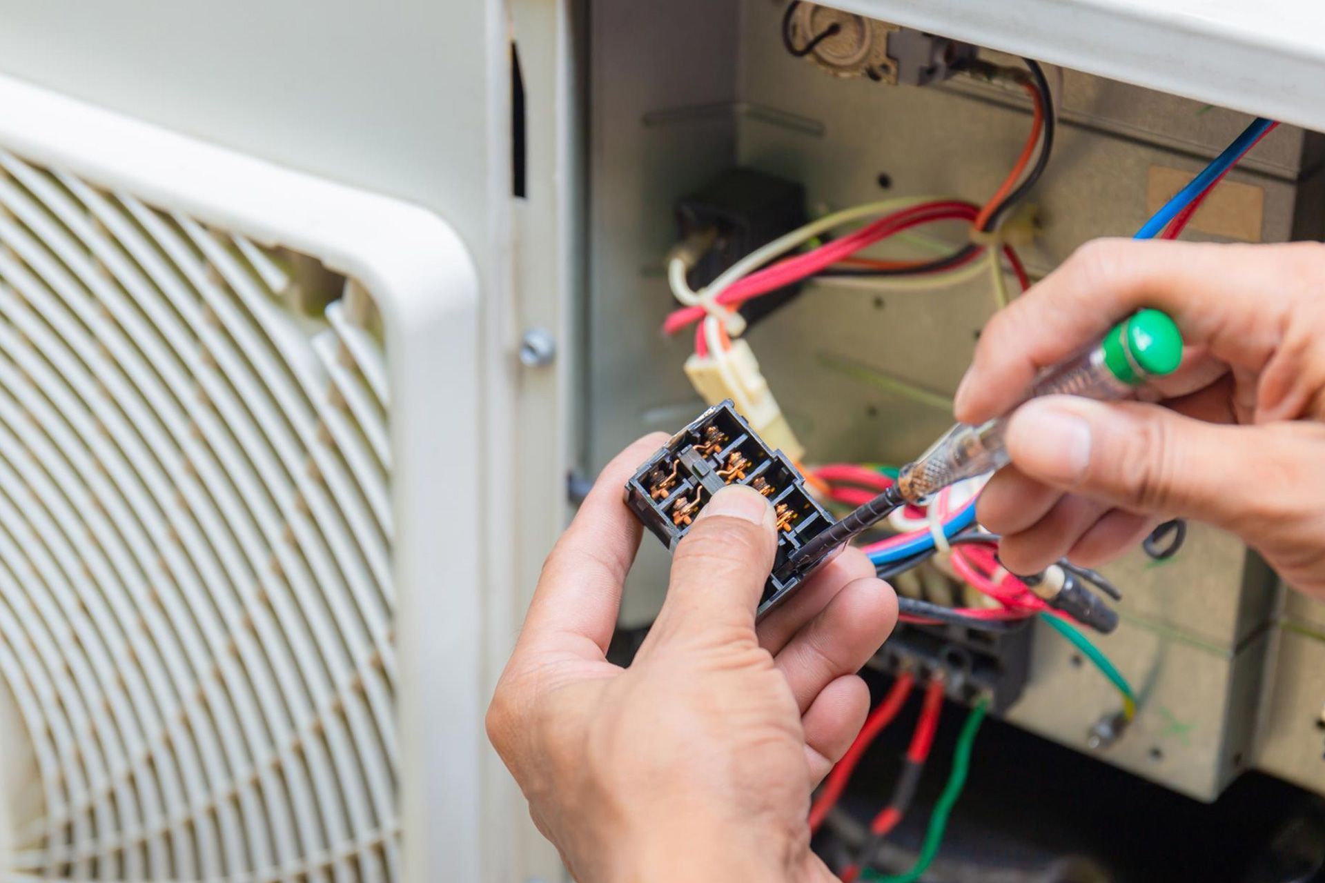 AC contactor close-up in a residential HVAC system