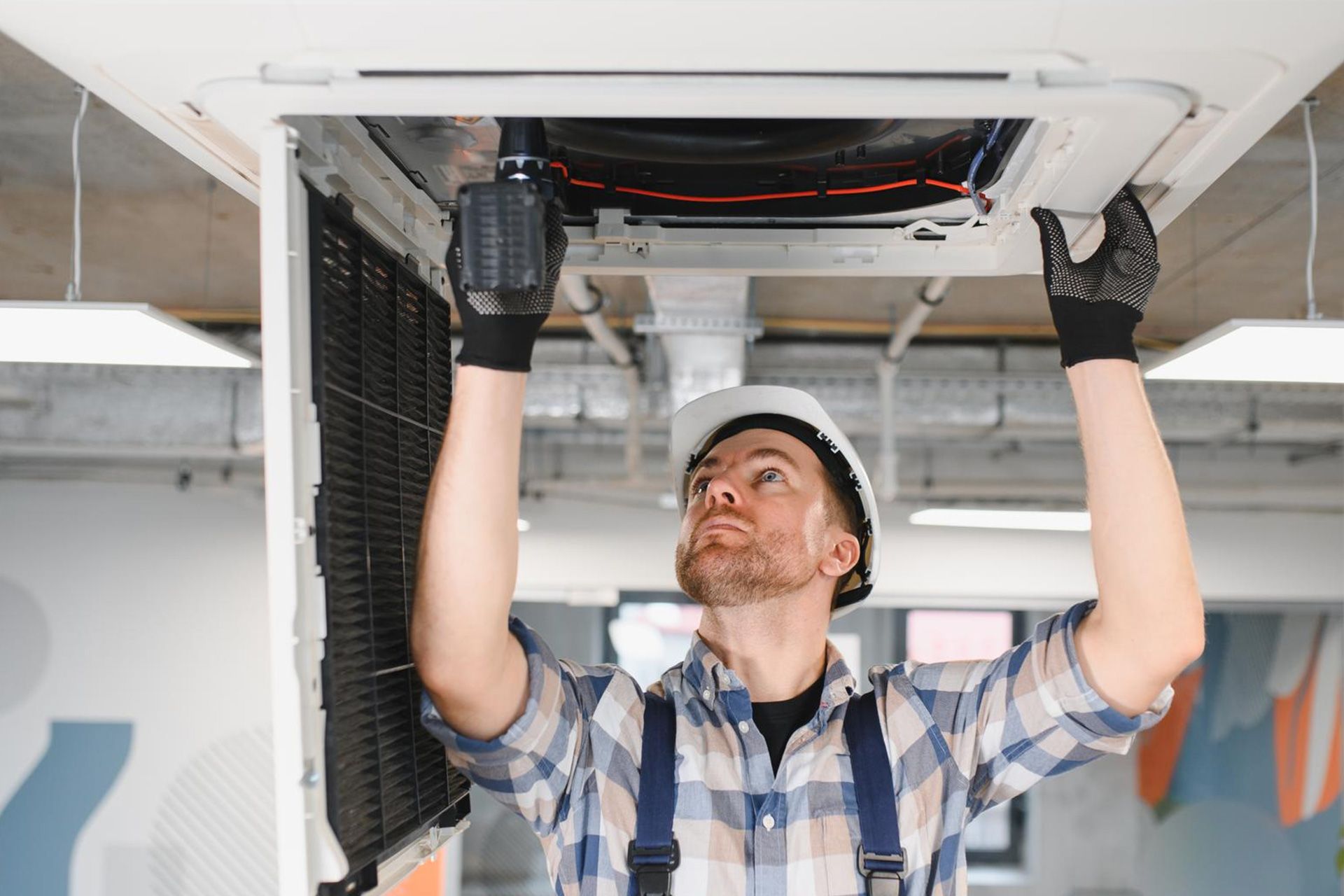 Emergency AC repair technician fixing unit
