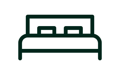 Dark green outline of a bed with headboard and two pillows