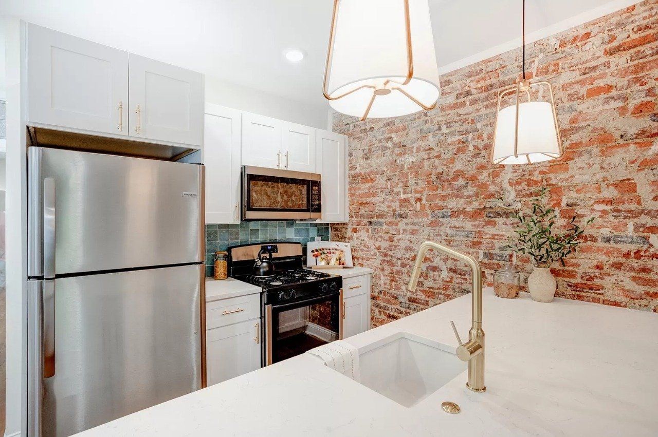 Kitchen with appliances and light