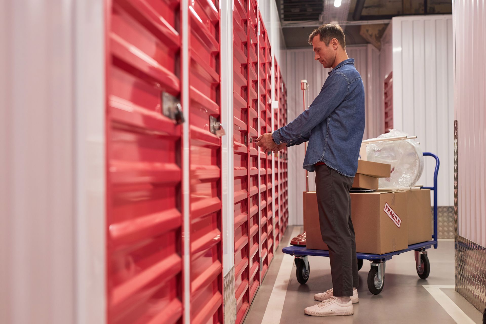 Customer opening lock of unit in self-storage facility