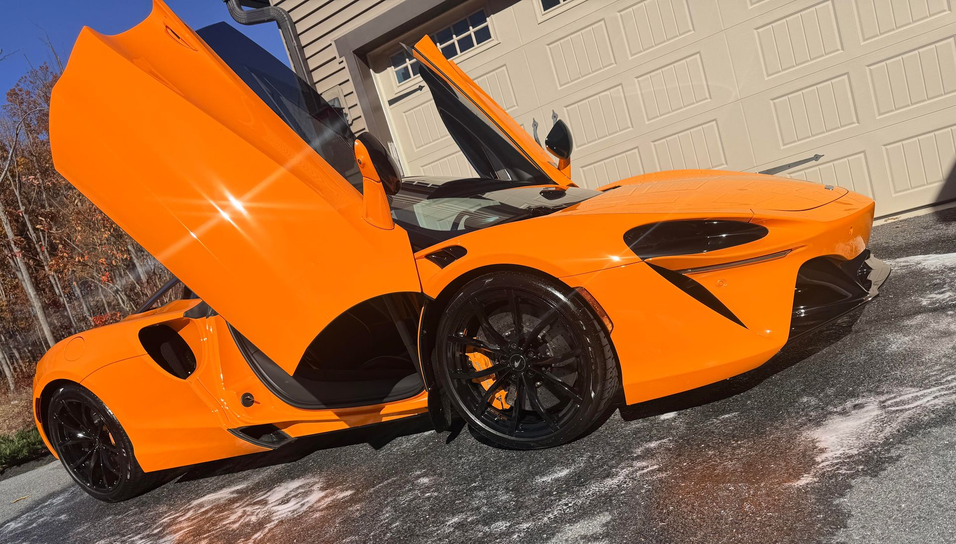 shiny and glossy orange car due to applied ceramic coating