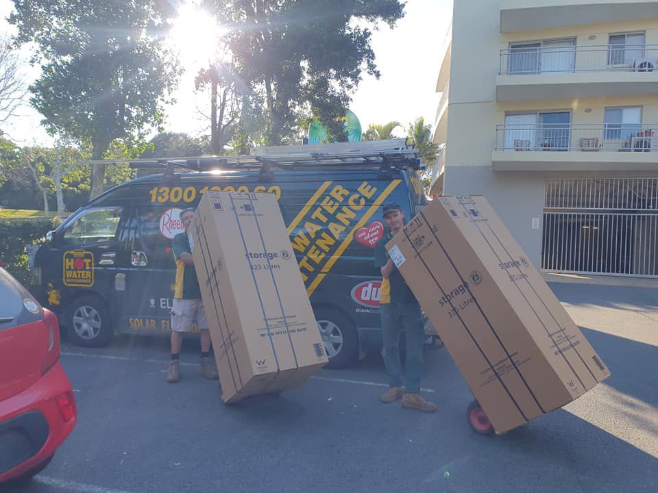 Team Delivering Hot Water Tank — Hot Water Maintenance in Port Macquarie, NSW