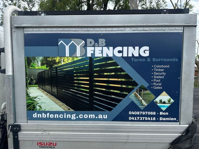 Truck Bed Showing Business Signage - D&B Fencing in Taree