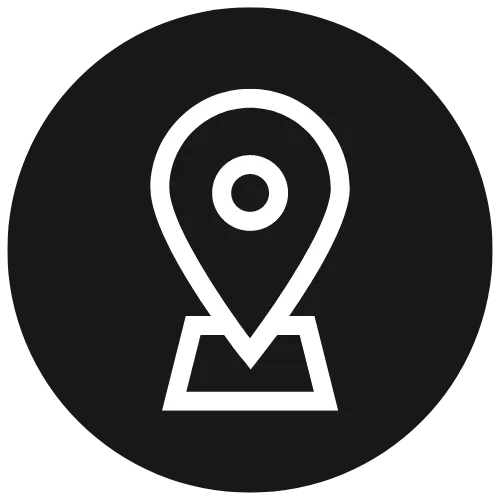 White location pin icon inside a black circle on a transparent background