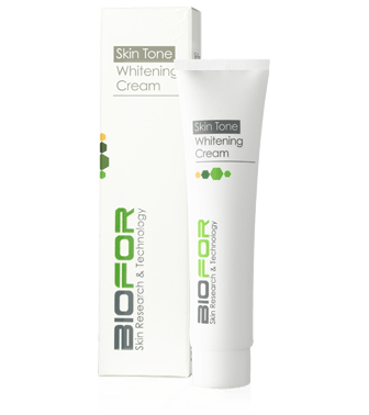White cosmetic cream tube and box labeled “Skin Tone Whitening Cream” on a white background
