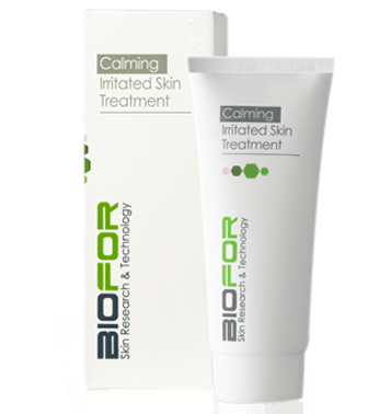 Calming Iritated Skin Treatment cream tube and box, white packaging with green accents