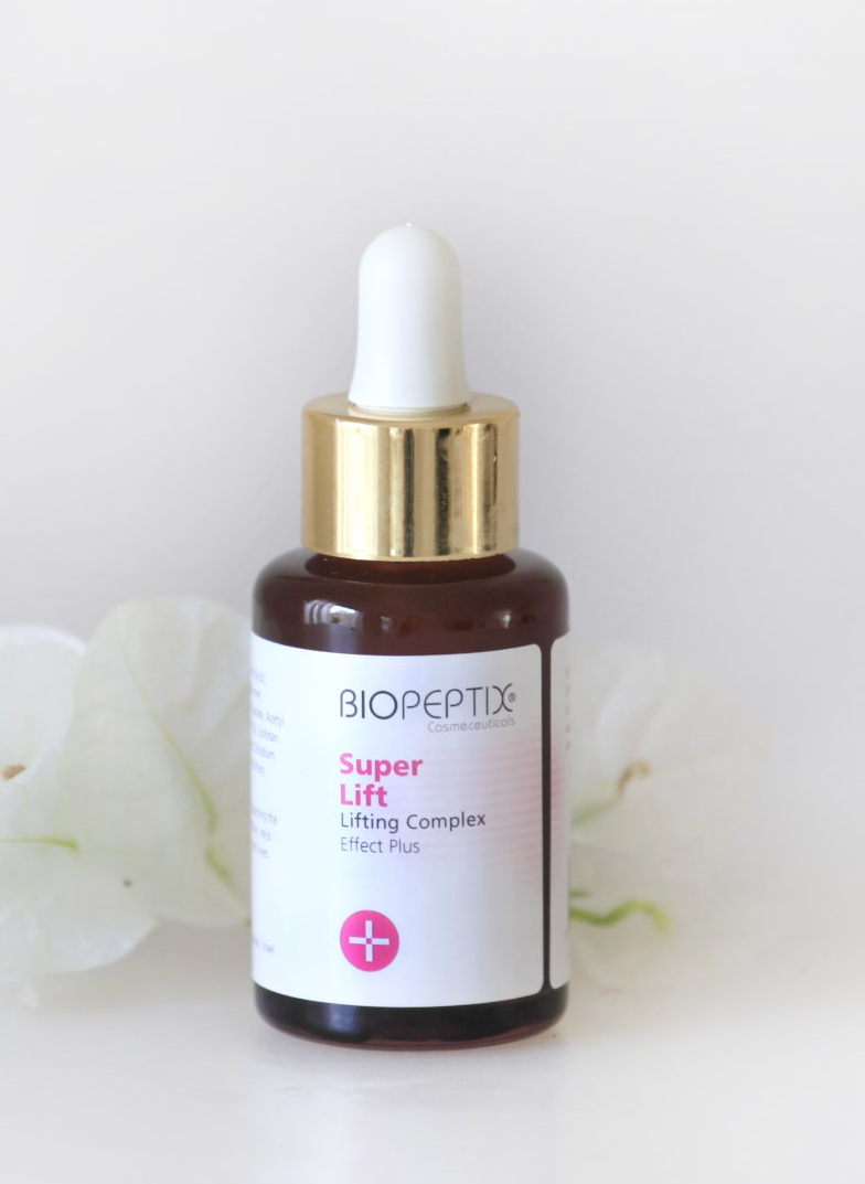 Bioreptix Super Lift serum bottle with gold dropper on a white background