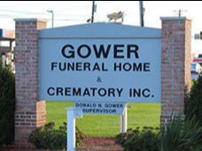 A sign for gower funeral home and crematory inc.