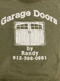 Green shirt with white text and a garage door graphic; "Garage Doors by Randy" with phone number 912-398-0981.
