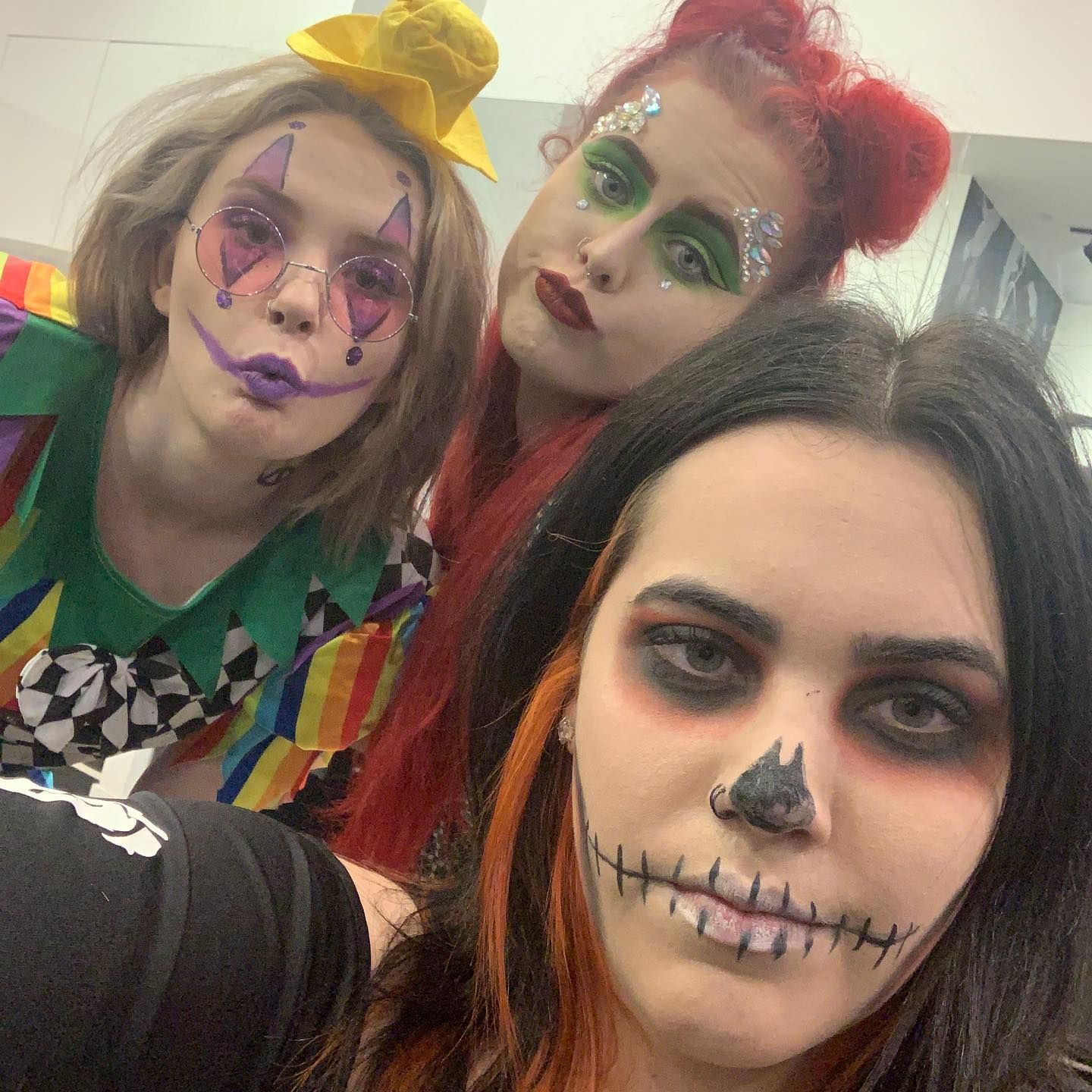 Three people in Halloween costumes: clown, Poison Ivy, and skull. — Wow! Excellence in Hair in Toowoomba, QLD