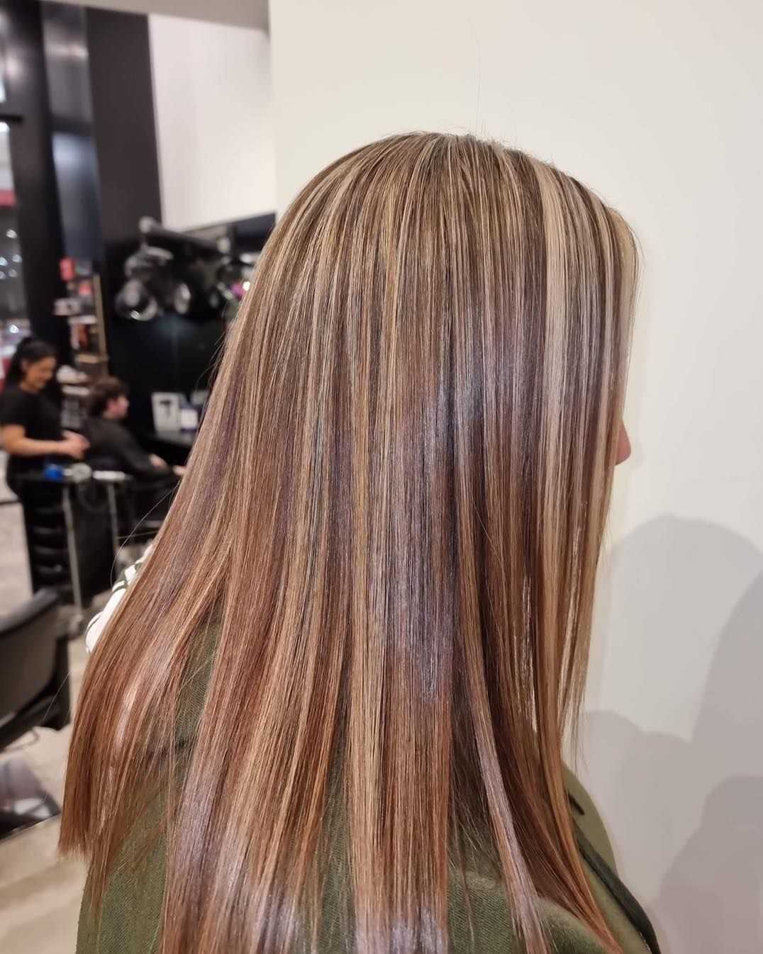 Woman With Long, Highlighted Hair in a Salon — Wow! Excellence in Hair in Toowoomba, QLD