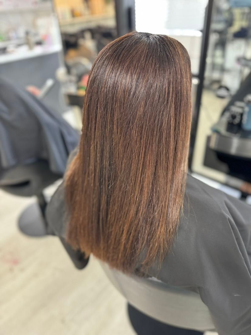 Woman With Smooth, Straight, Pale Pink Blonde Hair — Wow! Excellence in Hair in Toowoomba, QLD
