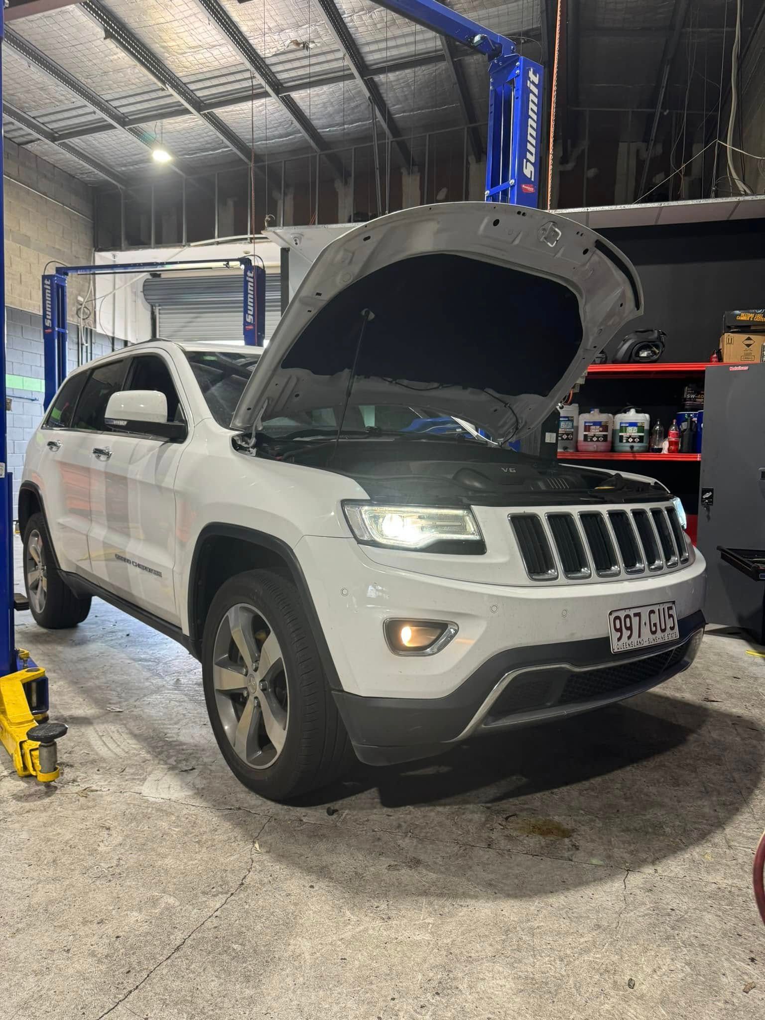 Silver SUV With Hood Open In An Auto Repair Shop — Mr Mechanical Auto Service Centre in Southport, QLD