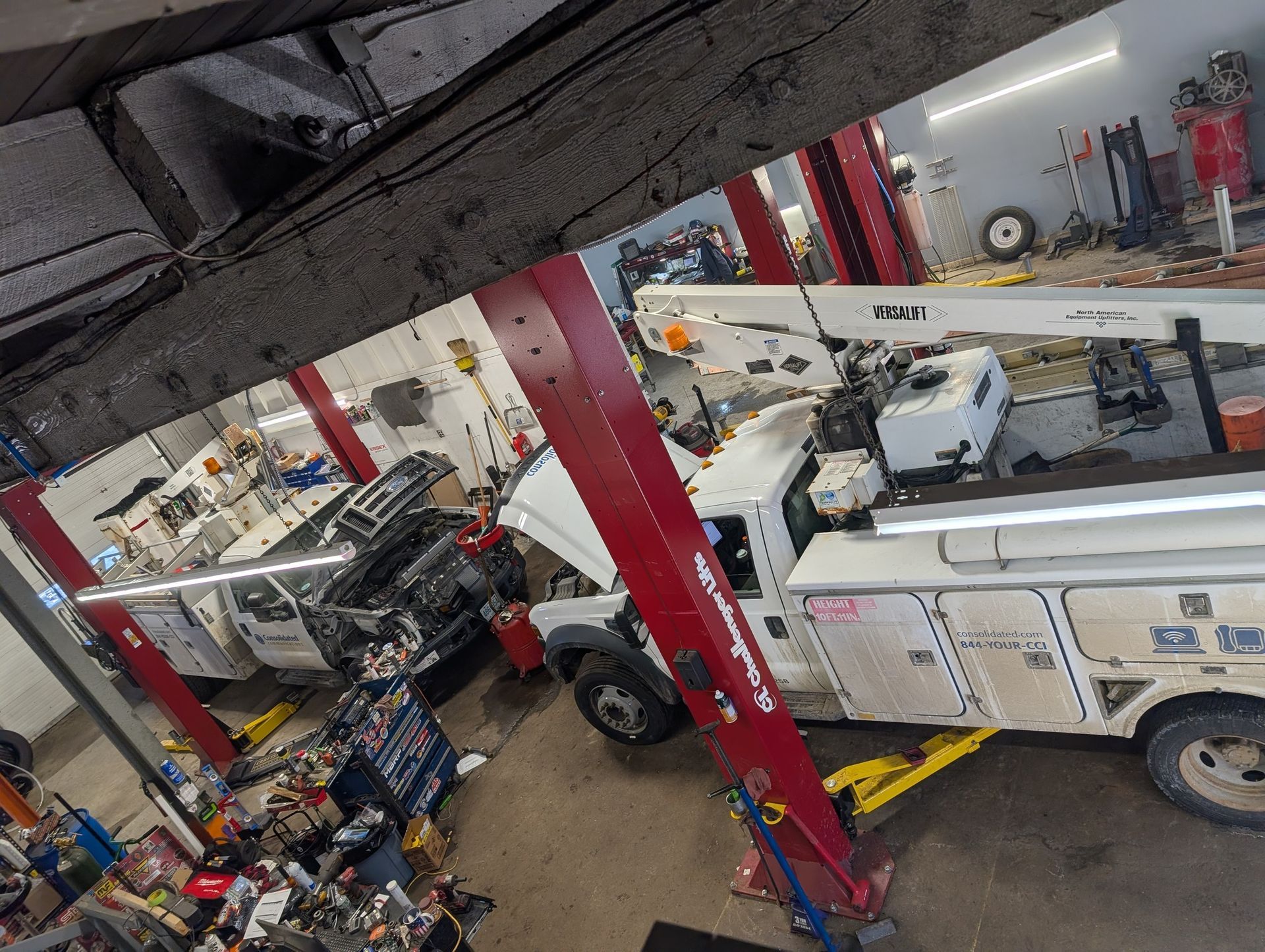 Overhead View Of Fleet Vehicles In Repair Shop | Garry's Fleet Services