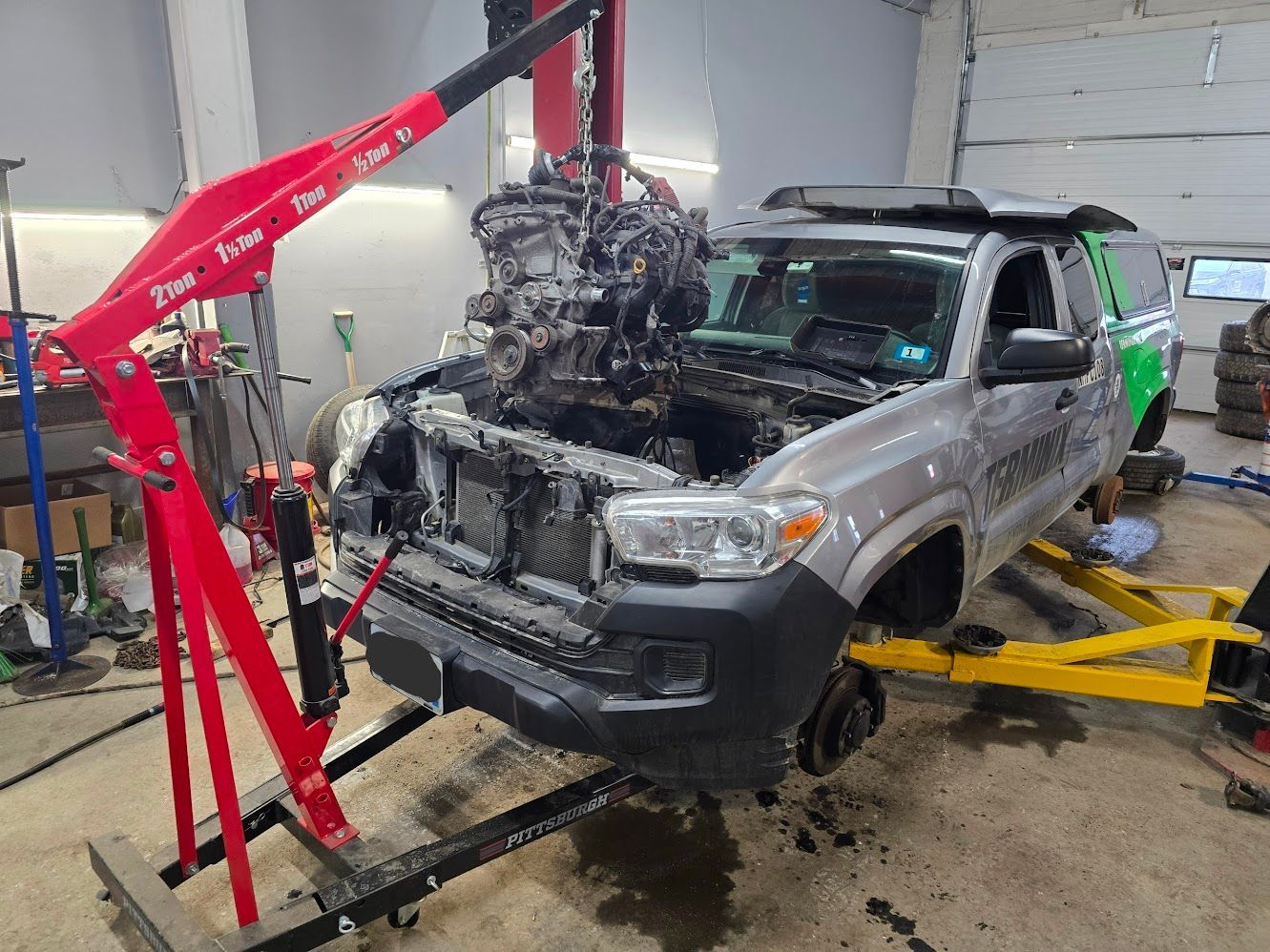 Engine Removal On Fleet SUV In Repair Shop | Garry's Fleet Services