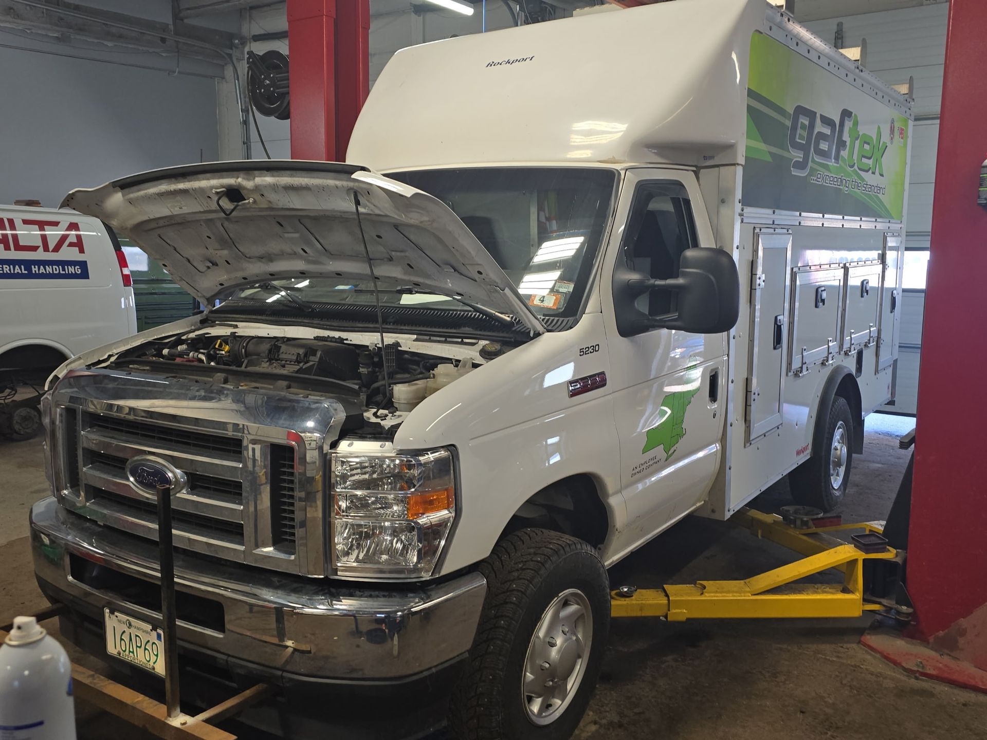 Commercial Fleet Truck Receiving Under Hood Service | Garry's Fleet Services