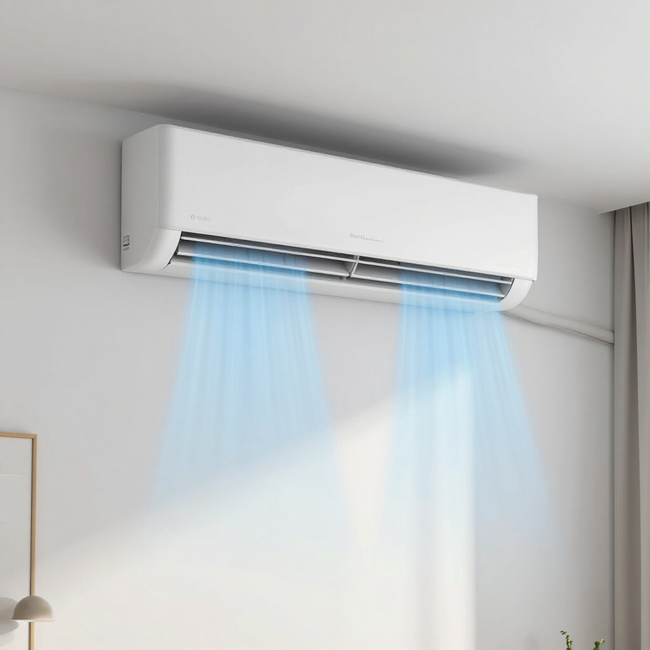 Wall-mounted white air conditioner blowing cool blue air into a bright room