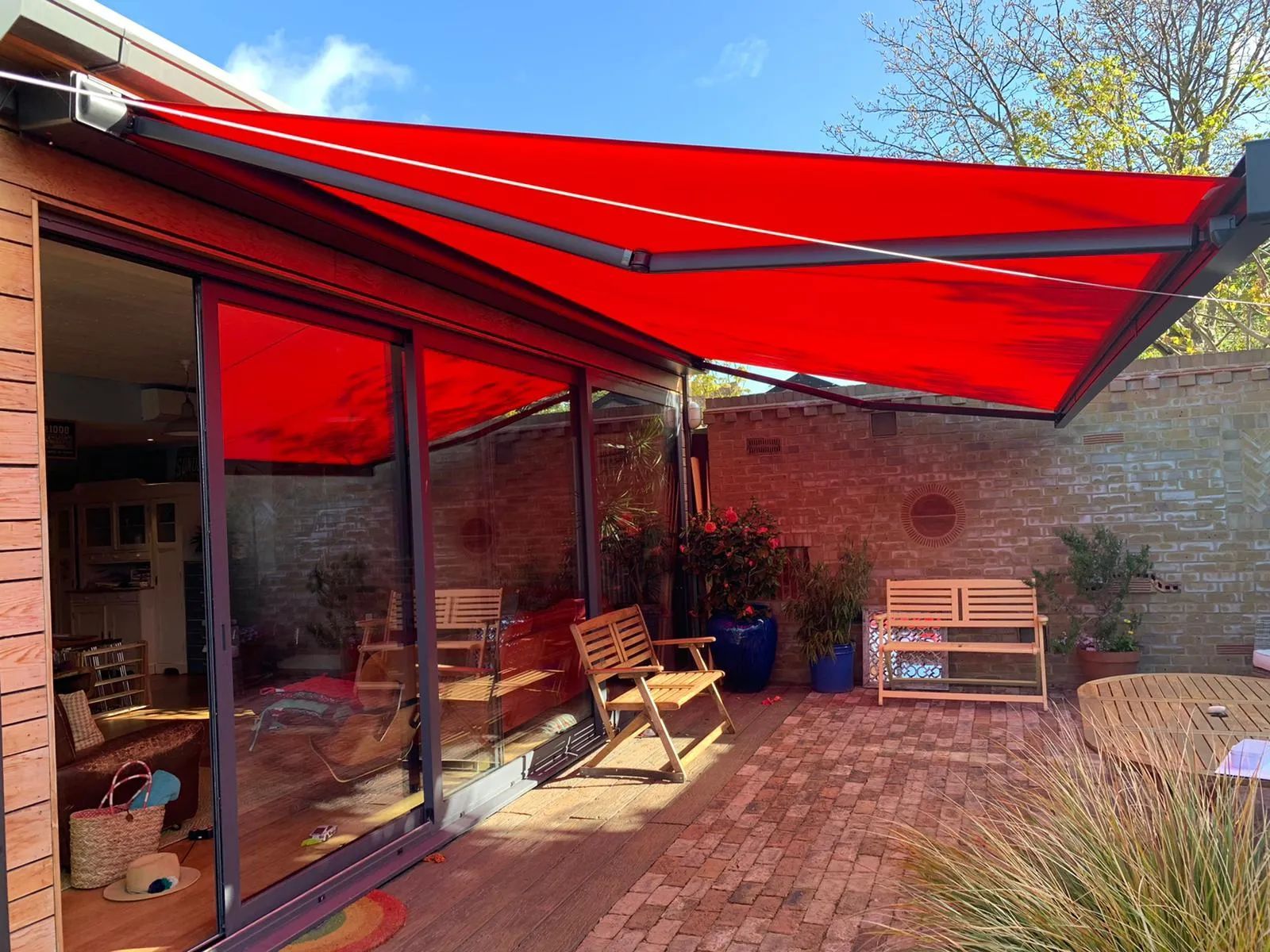 Red colour awnings for outdoor space