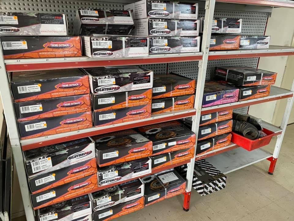 A Bunch of Metal Parts Are Laying on A Table — Multidrive Parts Australia in Taminda, NSW