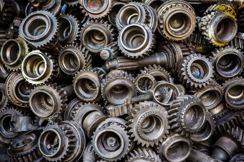 A Pile of Metal Gears and Bearings Sitting on Top of Each Other — Multidrive Parts Australia in Armidale, NSW