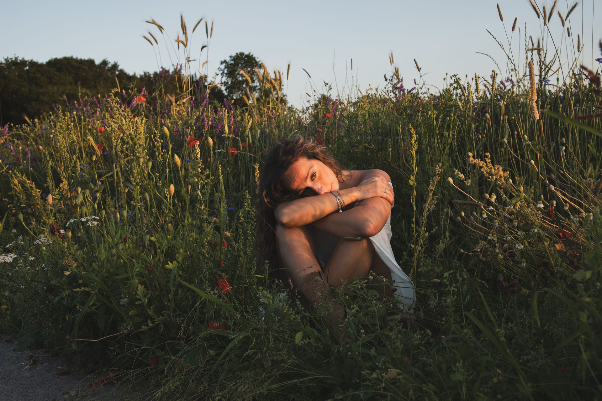 girl sitting in grass