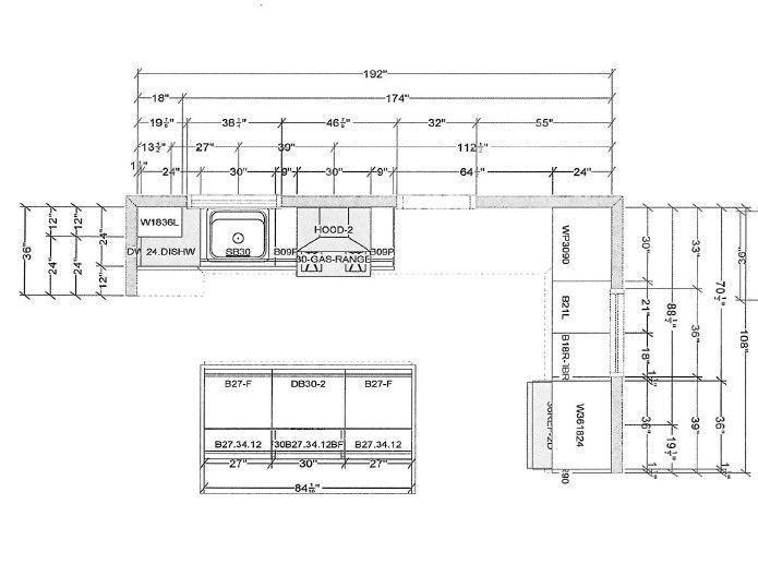 Architectural floor plan with dimension lines and labeled rooms in a small L-shaped layout